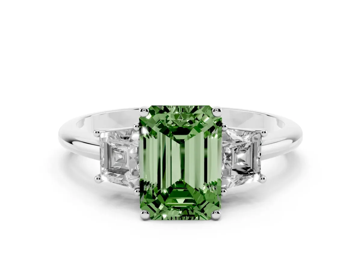 Fancy Green Emerald Cut Diamond Three-Stone Ring with Trapezoid Side Stones and Prong Setting Silver