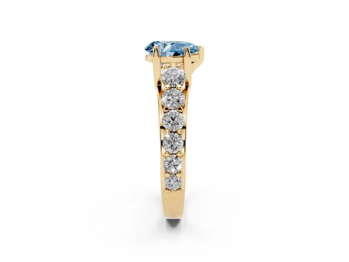 Fancy Blue Pear Cut Diamond Engagement Ring with Pavé Band and Four-Prong Setting Yellow gold