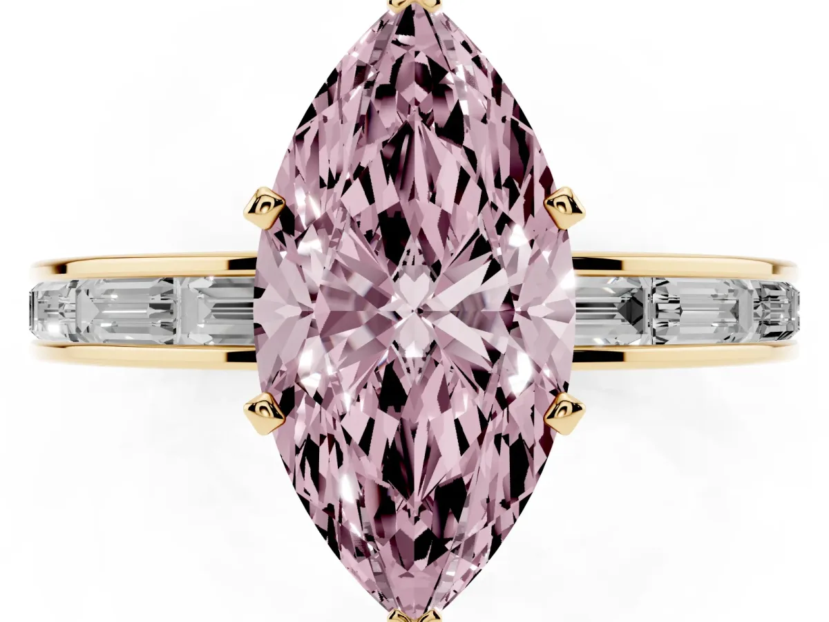 Fancy Pink Marquise Cut Solitaire Diamond Ring with Channel-Set Baguette Band and Four-Prong Setting Yellow gold
