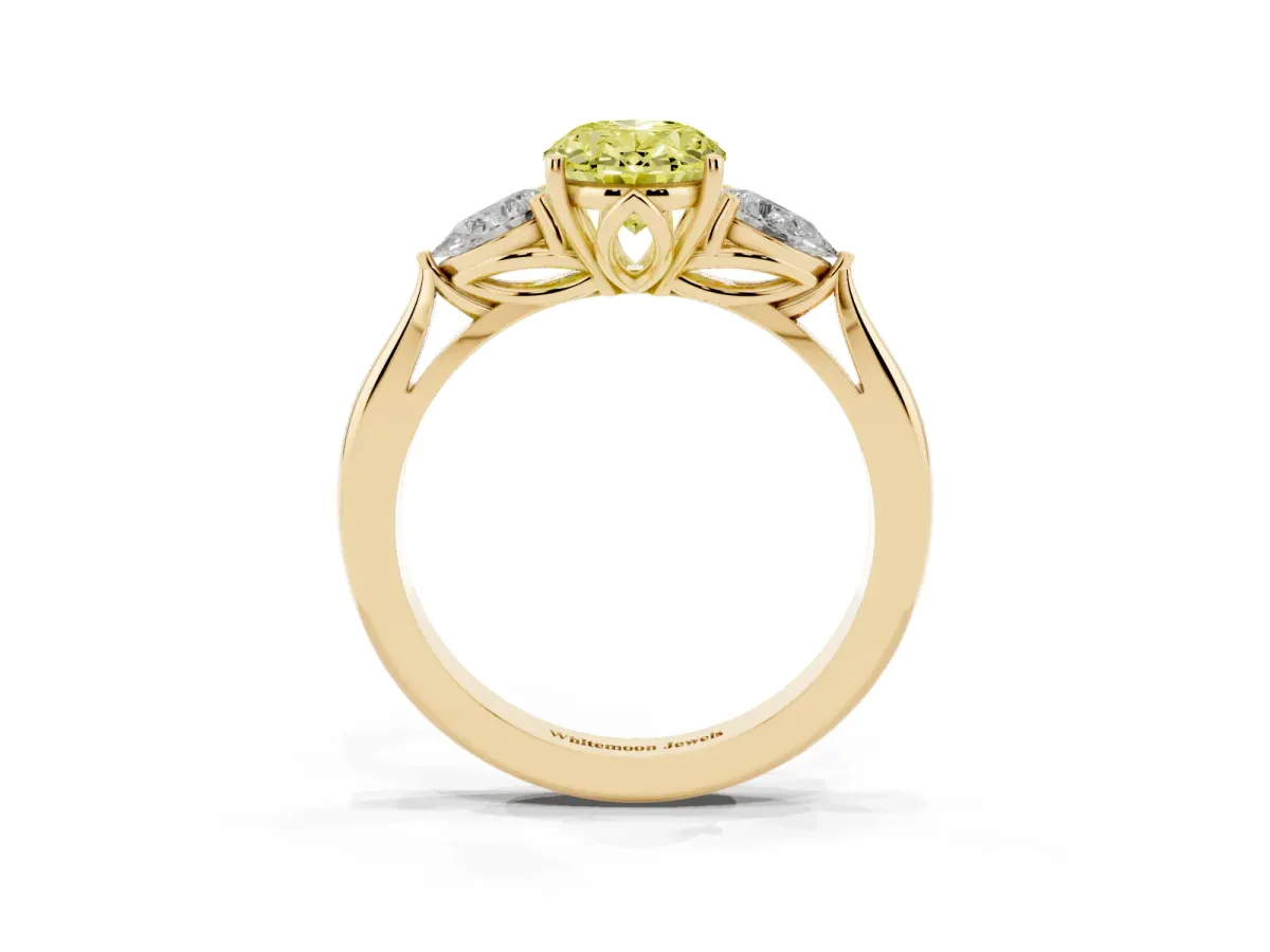 Fancy Yellow Three-Stone Oval Cut Brilliant Diamond Solitaire Ring with Tapered Band and Four-Prong Setting Yellow gold