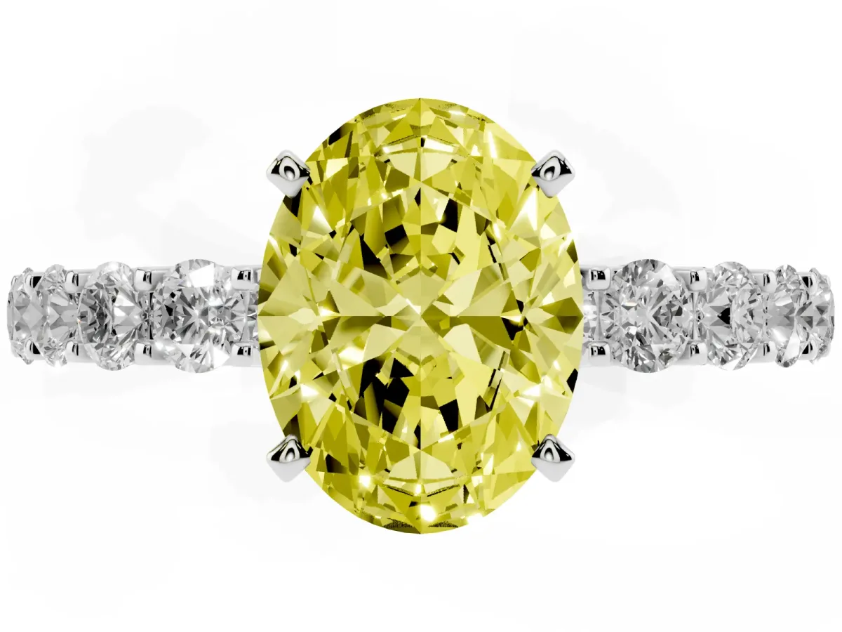 Fancy Yellow Oval Cut Diamond Solitaire Ring with Shared Prong Pavé Band and Four-Prong Setting Silver