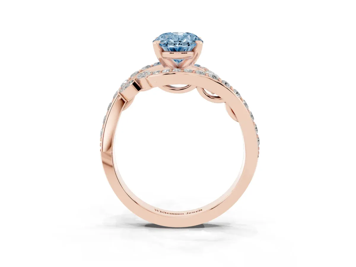 Fancy Blue Oval Cut Solitaire with Pavé Twist Band and Four-Prong Setting Rose gold
