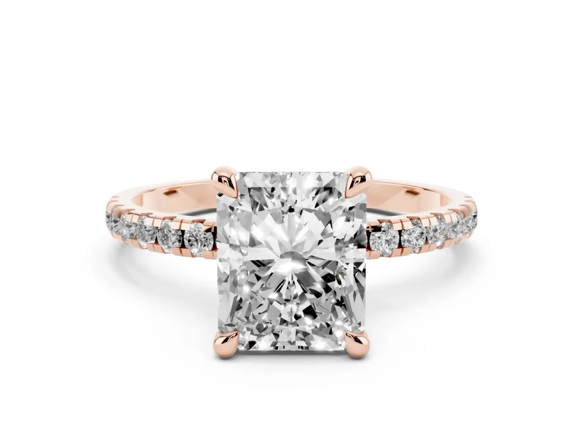 Radiant Cut Diamond Brilliant Solitaire Ring with Pavé Band and Four-Prong Setting Rose gold