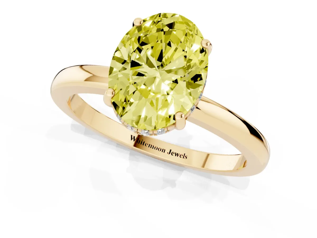 Fancy Yellow Oval Cut Solitaire Diamond Ring with Prong Setting and Plain Band Yellow gold