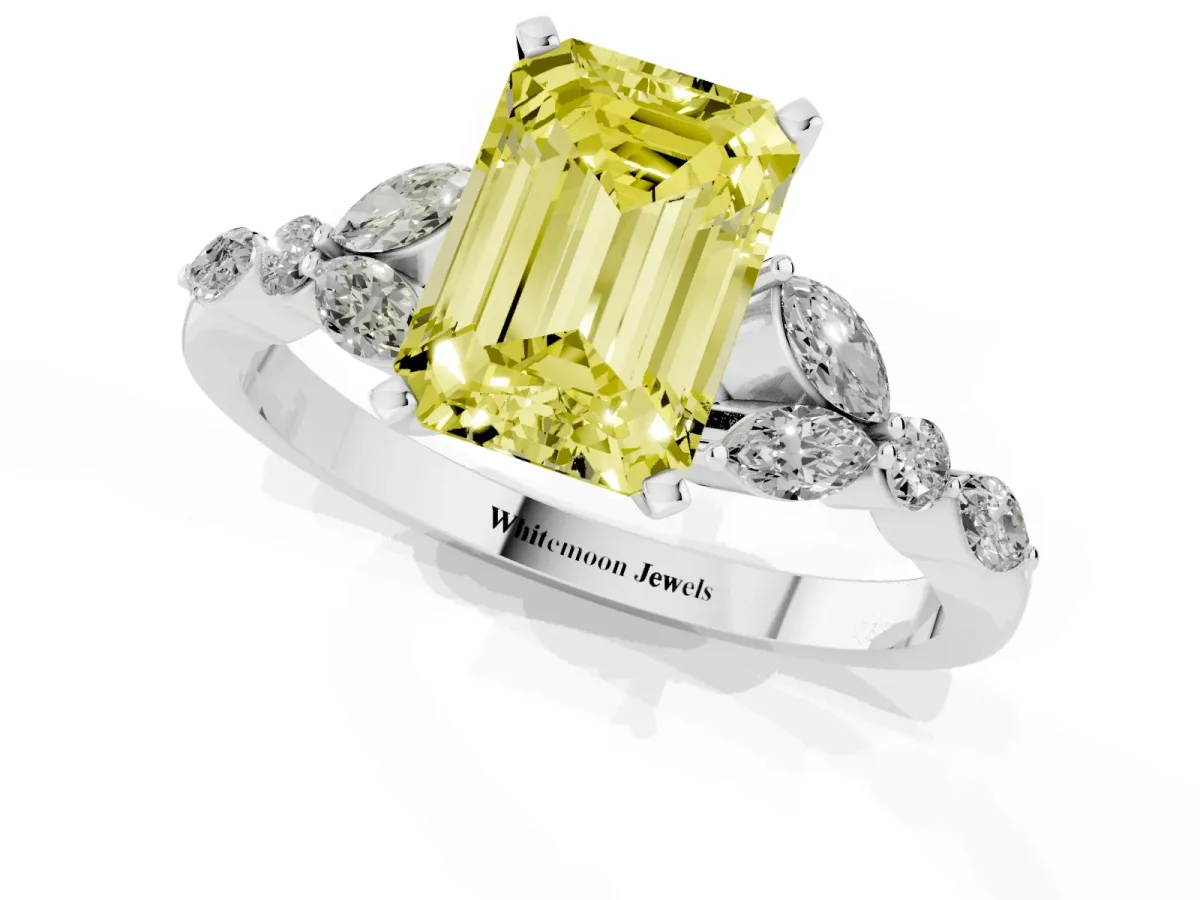 Fancy Yellow Emerald Cut Diamond Solitaire Ring with Side Stones and Four-Prong Setting Platinum