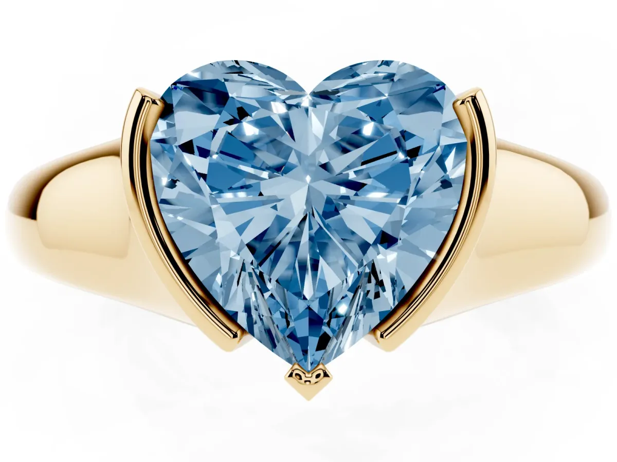 Fancy Blue Heart Cut Solitaire Tension Set Diamond Ring with Split Shank Band Yellow gold
