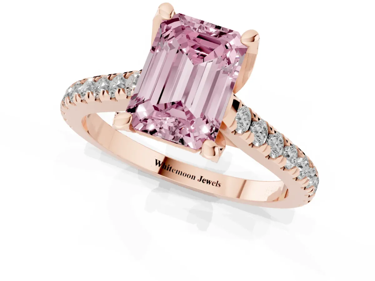 Fancy Pink Emerald Cut Brilliant Diamond Solitaire with Pavé Band and Four-Prong Setting Rose gold