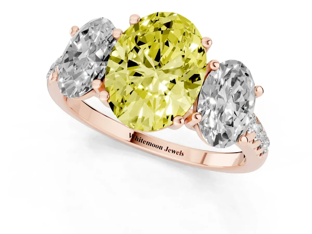 Fancy Yellow Three-Stone Oval Cut Diamond Ring with Round Pavé Band and Prong Setting Rose gold