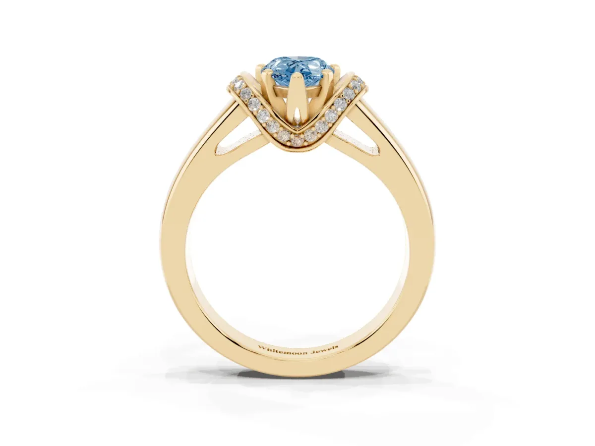 Fancy Blue Pear Cut Solitaire Diamond Ring with Pave Band and Six-Prong Setting Yellow gold