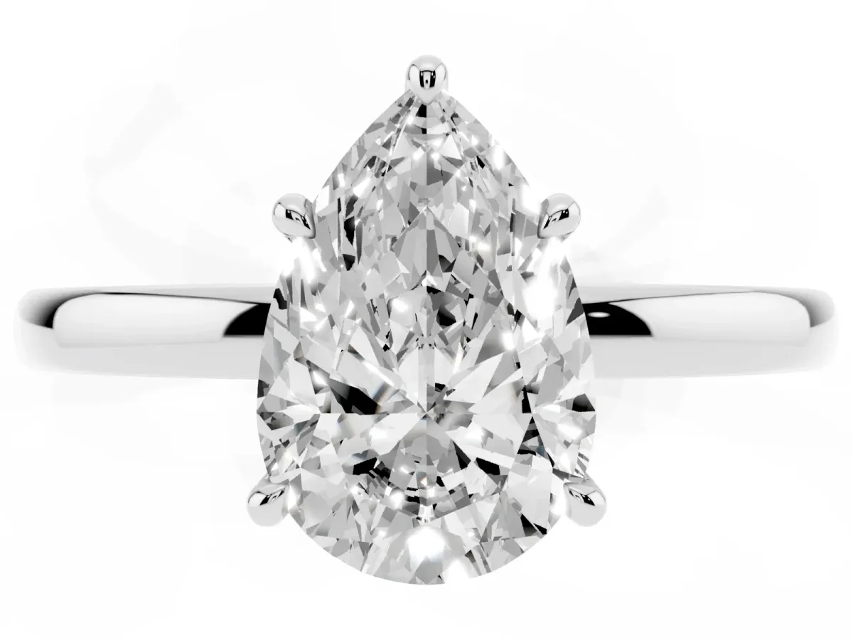 Pear Cut Solitaire Engagement Ring with Cathedral Band and Four-Prong Setting Silver