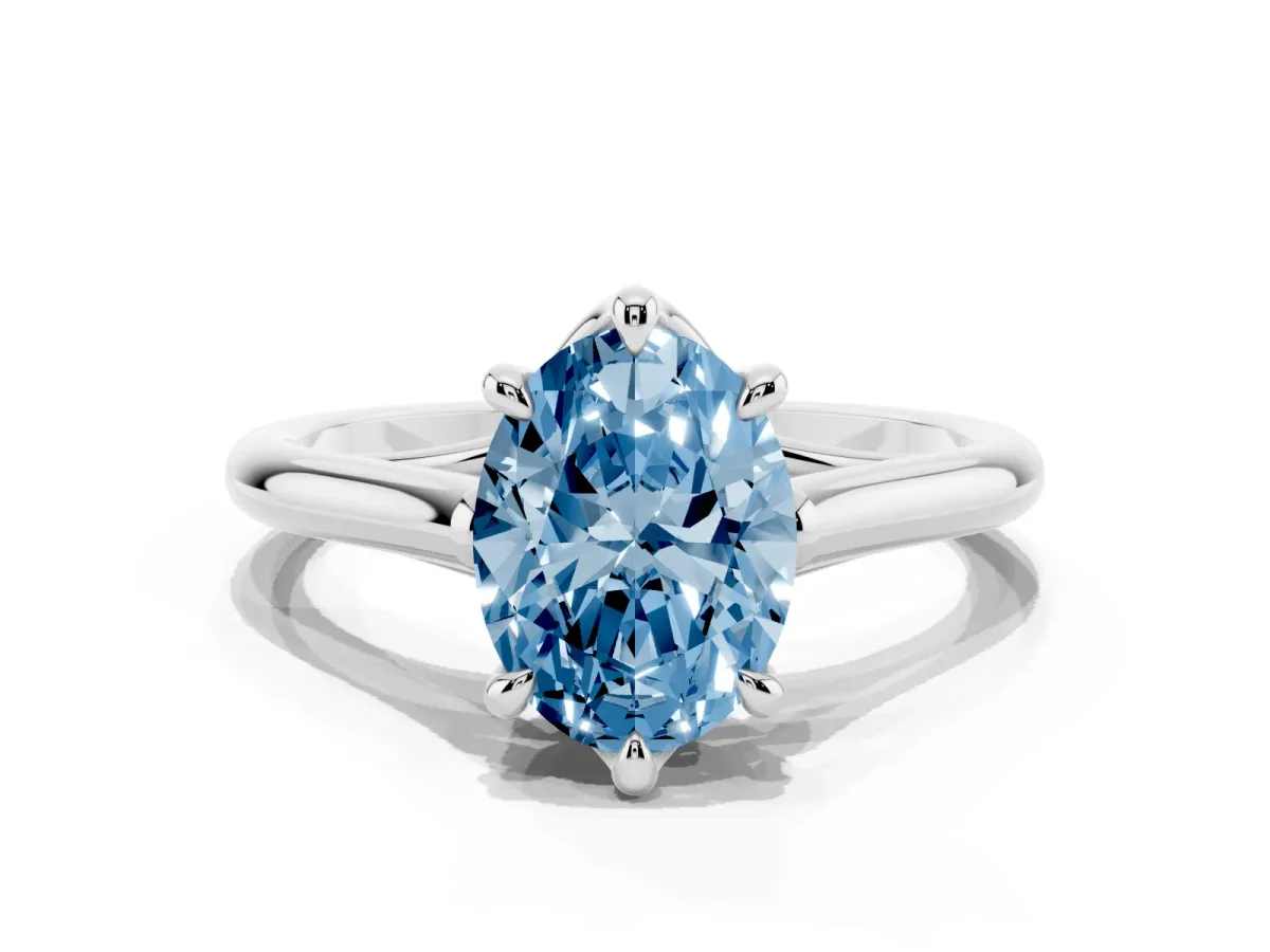 Fancy Blue Oval Cut Solitaire Engagement Ring with Six-Prong Setting and Classic Band Silver