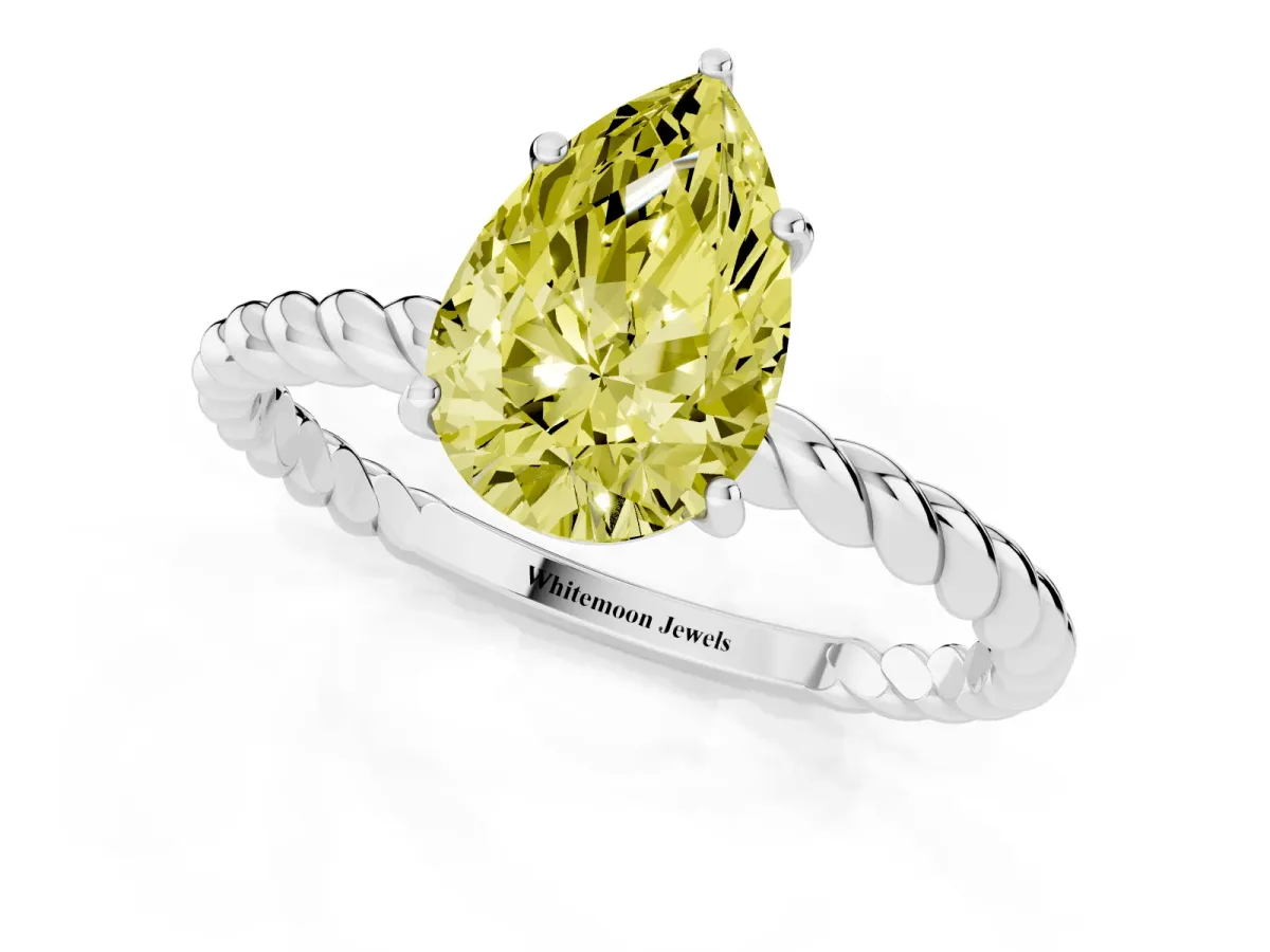 Fancy Yellow Pear Cut Solitaire Twist Band Ring with Four-Prong Setting Silver