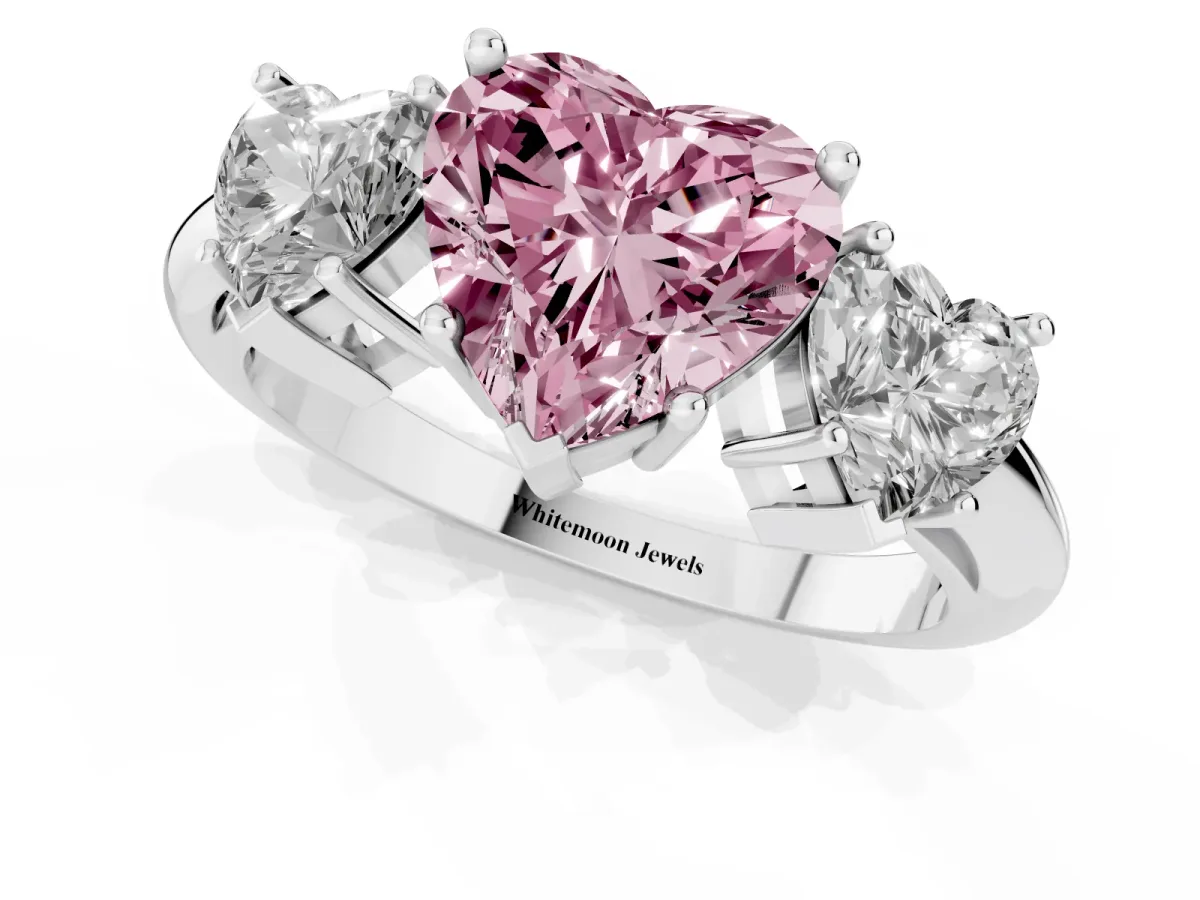 Fancy Pink Three-Stone Heart Cut Cut Diamond Engagement Ring with Prong Setting on a White Gold Band Silver