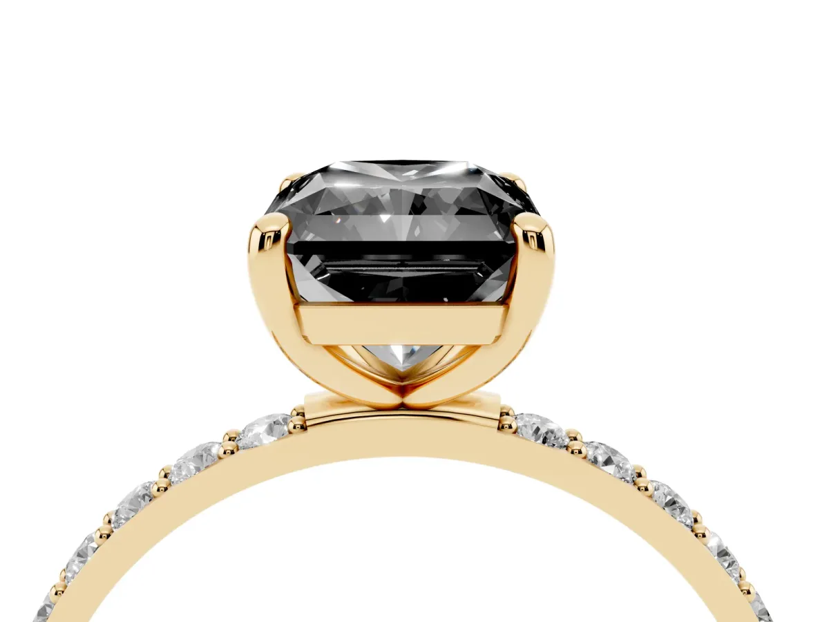 Fancy Black Radiant Cut Diamond Solitaire Ring with Round Pavé Band and Prong Setting Yellow gold