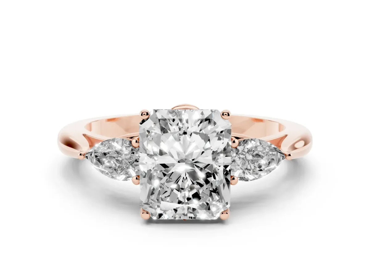 Three-Stone Radiant Cut Diamond Ring with Pear Side Stones in Four-Prong Setting Rose gold