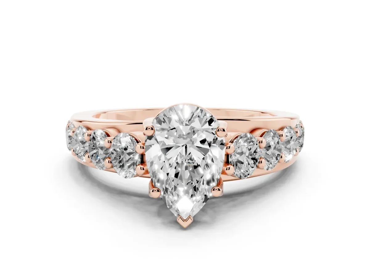 Pear Cut Diamond Engagement Ring with Pavé Band and Four-Prong Setting Rose gold