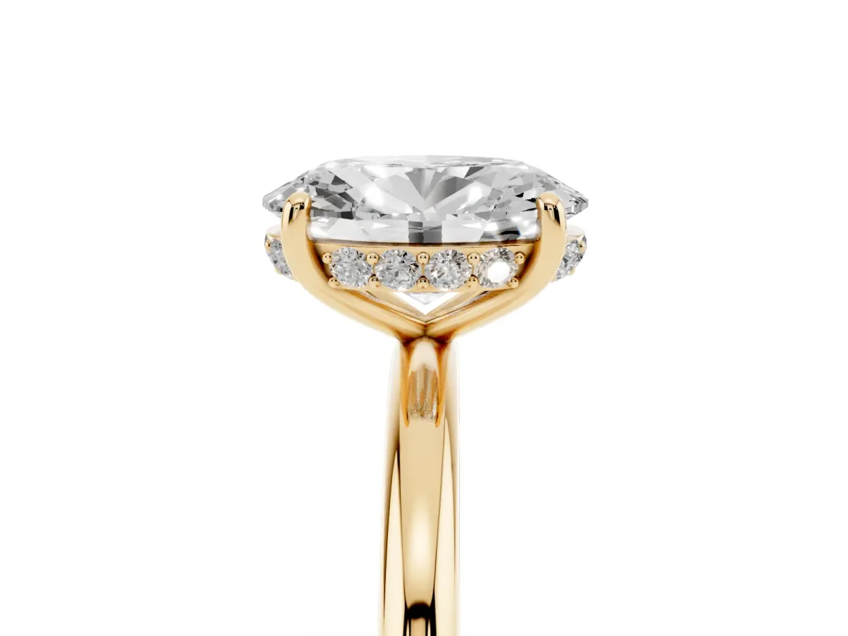 Oval Cut Solitaire Diamond Ring with a Classic Band and Four-Prong Setting Yellow gold