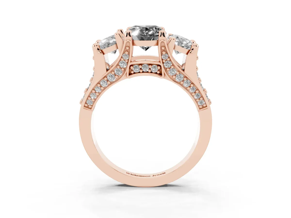 Fancy Black Oval Cut Diamond Three-Stone Ring with Channel Set Band and Four-Prong Setting Rose gold
