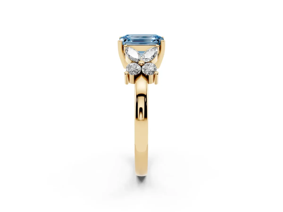 Fancy Blue Emerald Cut Diamond Floral Cluster Ring with Solitaire Band and Prong Setting Yellow gold