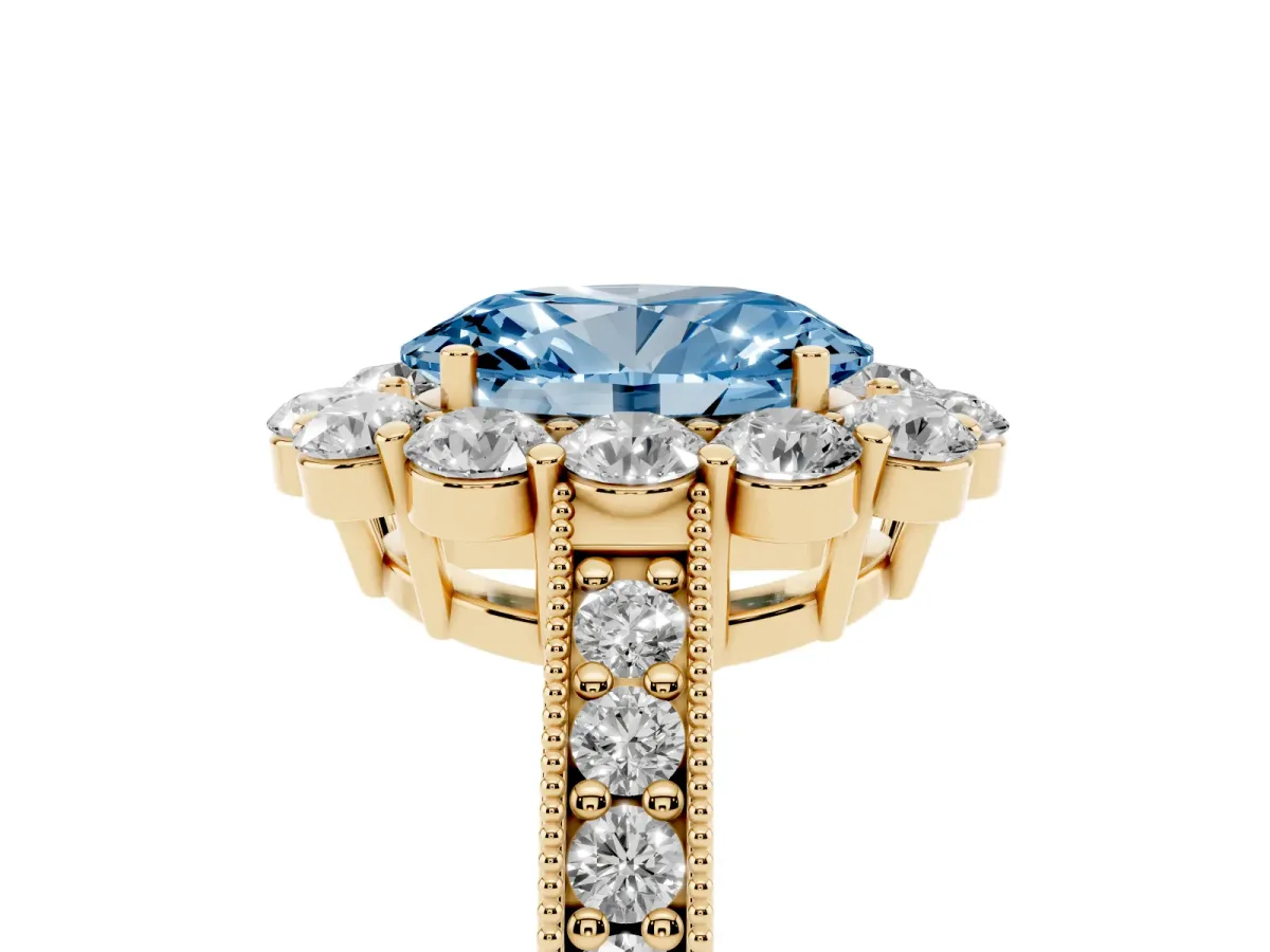 Fancy Blue Oval Cut Cut Halo Diamond Pavé Engagement Ring with Milgrain Detailing Yellow gold