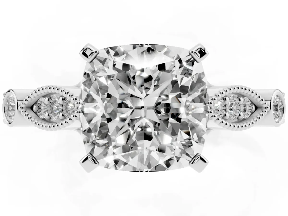 Cushion Cut Cut Diamond with Milgrain Marquise and Bezel Accents on a Solitaire Band with Prong Setting Platinum