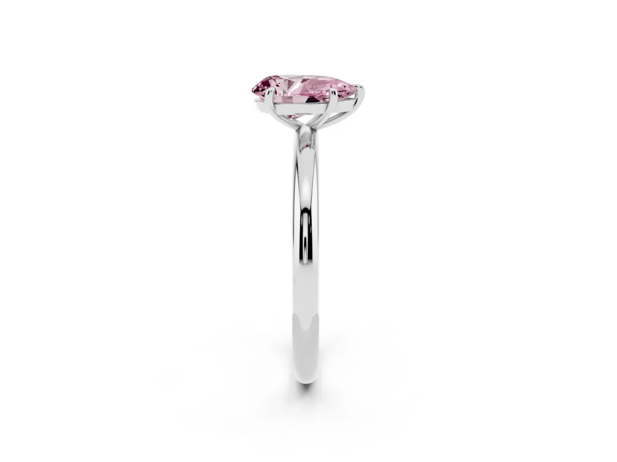 Fancy Pink Pear Cut Solitaire Diamond Ring with Four-Prong Setting on a Plain Band Platinum