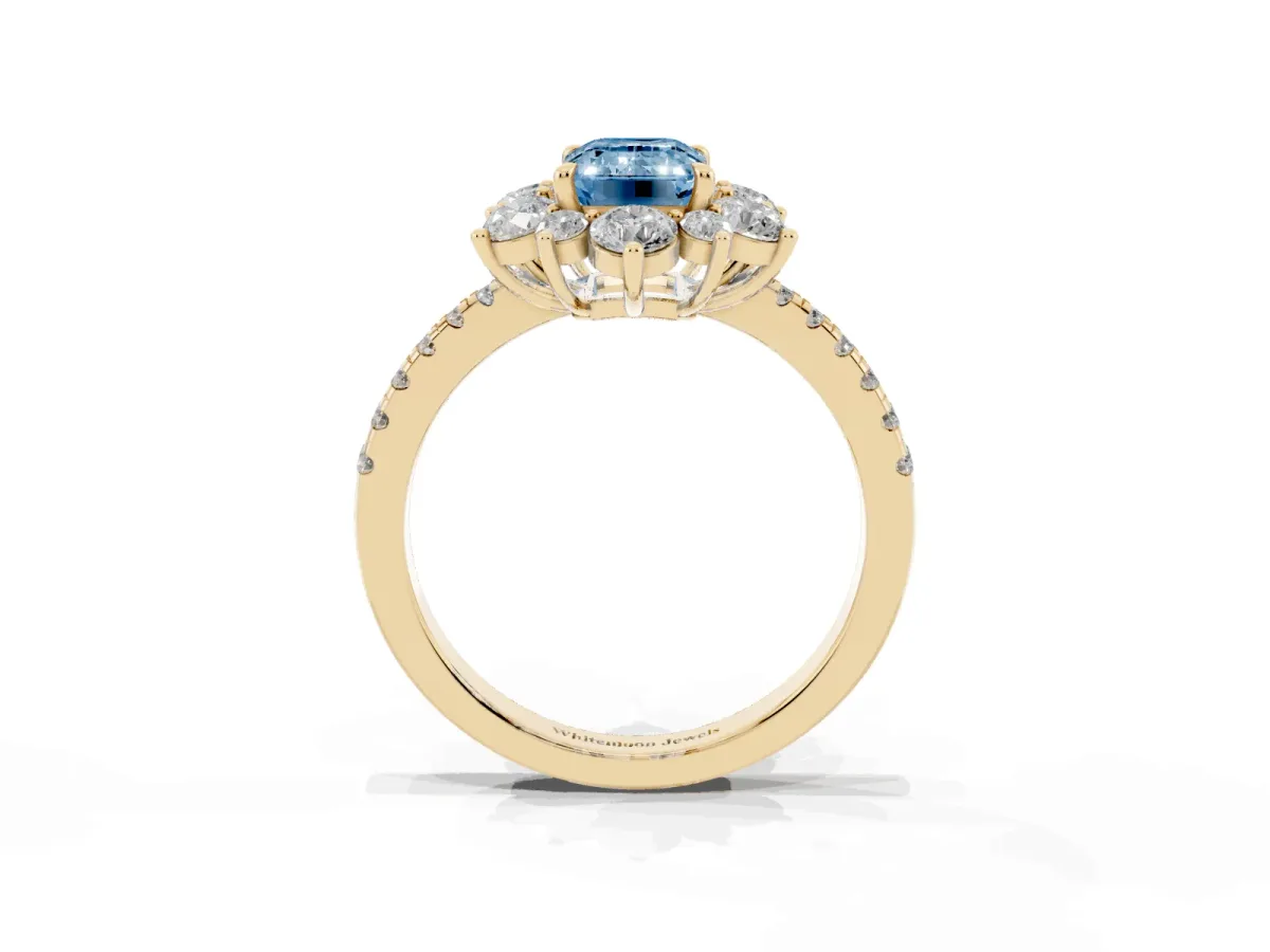 Fancy Blue Emerald Cut Diamond Floral Halo Ring with Round Pavé Band and Prong Setting Yellow gold