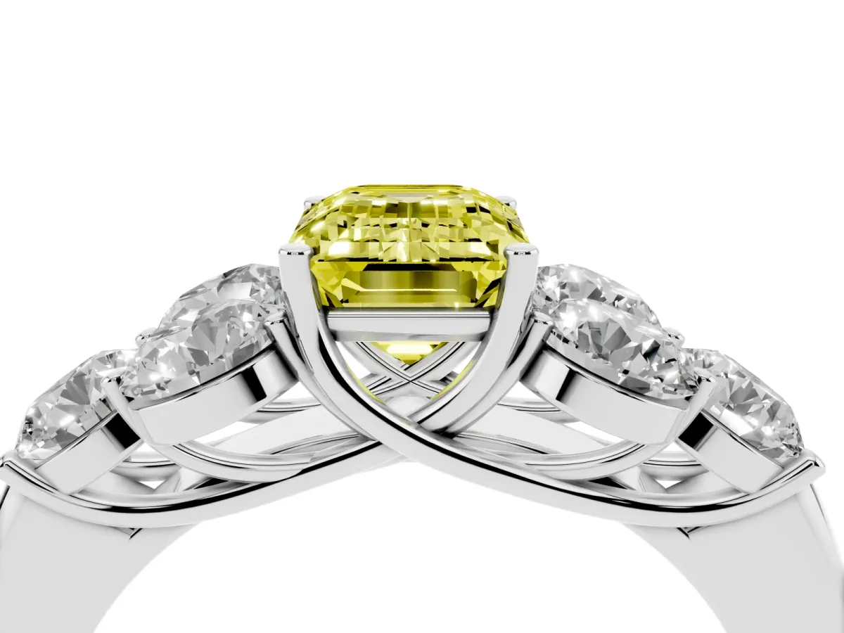 Fancy Yellow Emerald Cut Cut Diamond Cluster Ring with Round Accent Stones and Prong Setting on a Classic Band Silver