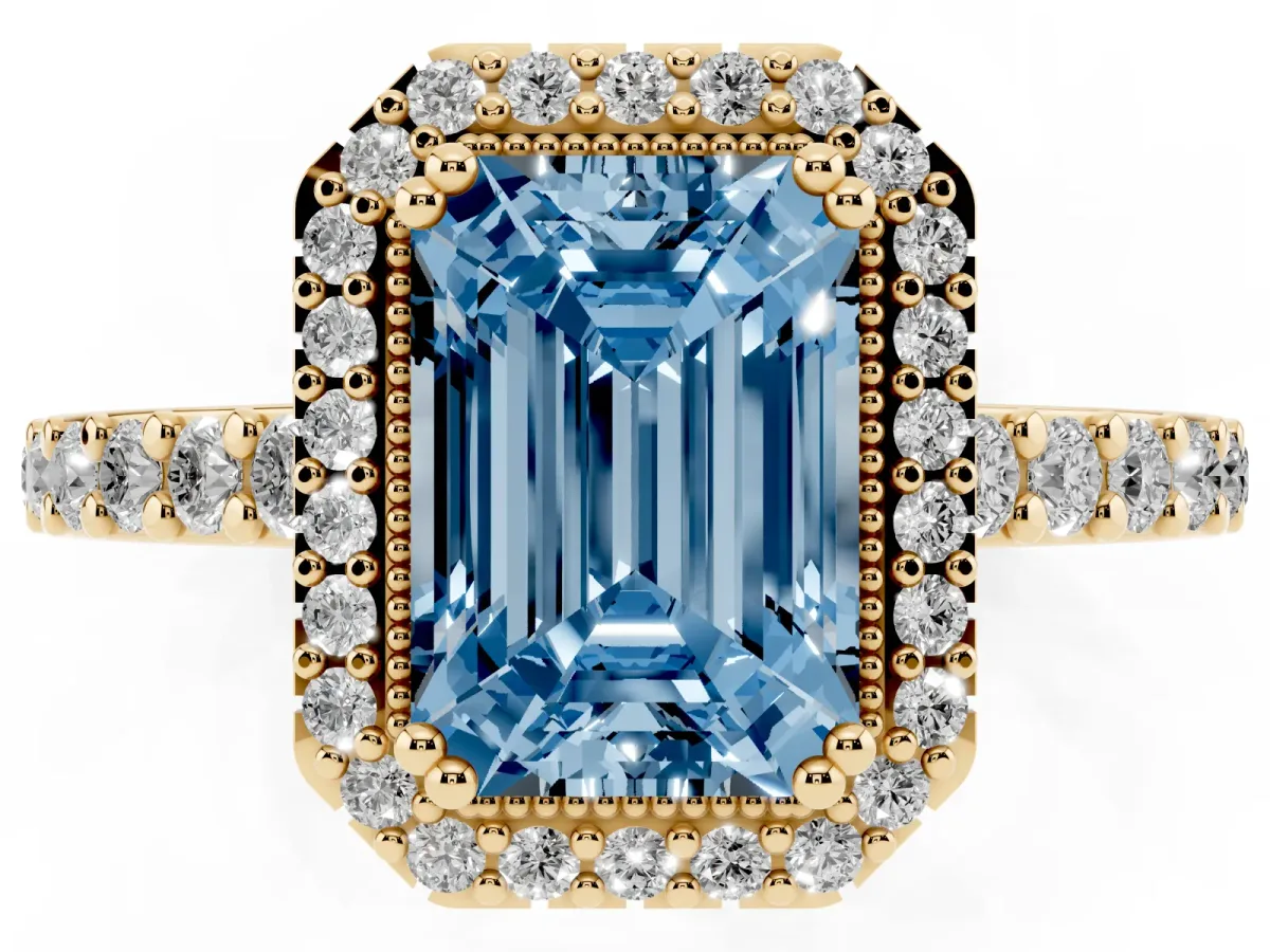 Fancy Blue Emerald Cut Cut Diamond Halo Engagement Ring with Milgrain Detail and Pavé Band Yellow gold