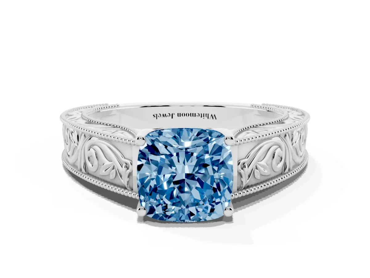 Fancy Blue Cushion Cut Diamond Solitaire Ring with Engraved Band and Four-Prong Setting Platinum