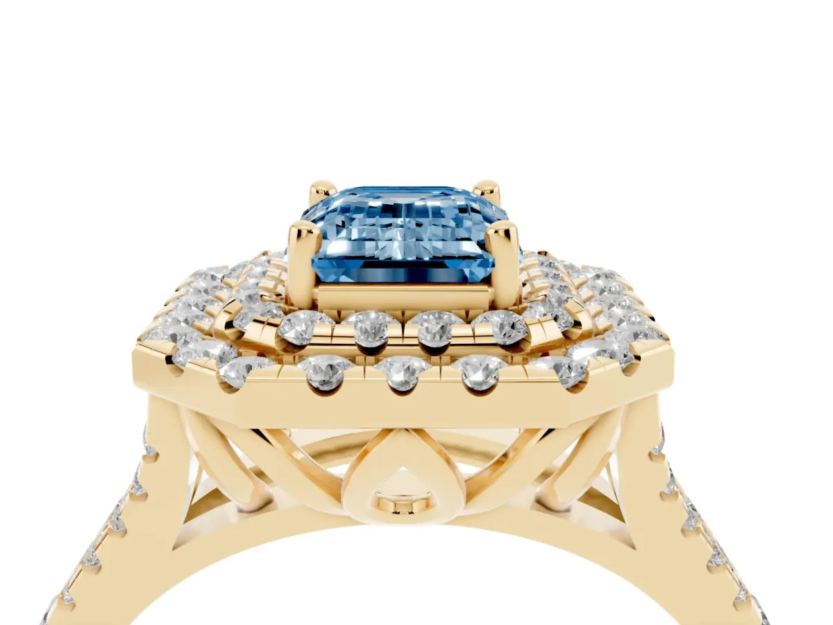 Fancy Blue Double Halo Emerald Cut Diamond Pavé Split Shank Ring with Prong Setting Yellow gold