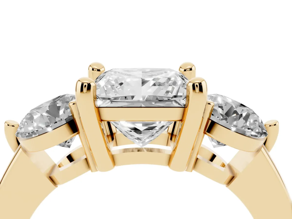Three-Stone Princess Cut Brilliant Cut Solitaire Ring with Prong Setting on a Classic Band Yellow gold