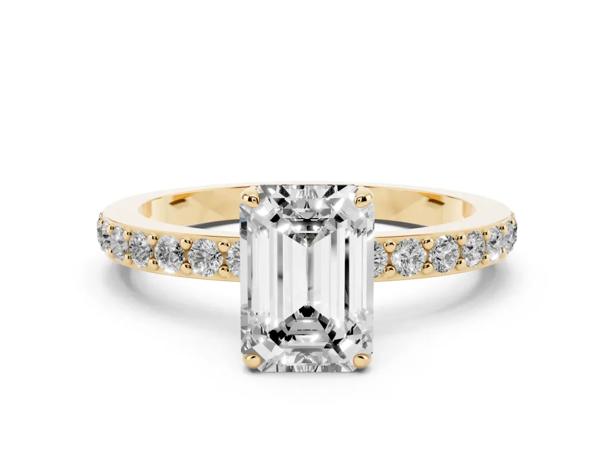 Emerald Cut Diamond Solitaire Engagement Ring with Pavé Band and Four-Prong Setting Yellow gold