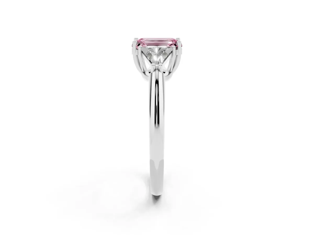 Fancy Pink Three-Stone Emerald Cut Diamond Engagement Ring with Trillion Side Stones and Prong Setting Silver