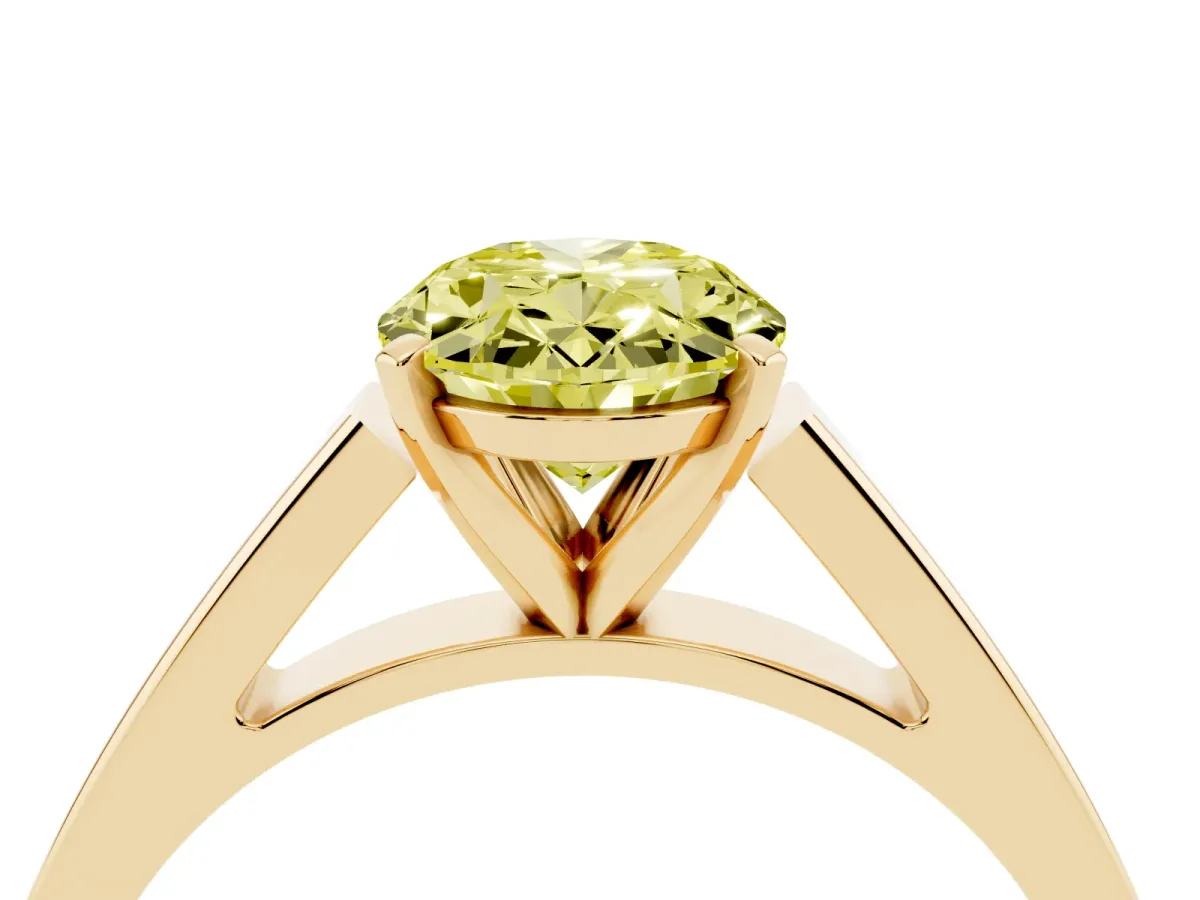 Fancy Yellow Oval Cut Solitaire Engagement Ring with Four-Prong Setting and Tapered Band Yellow gold
