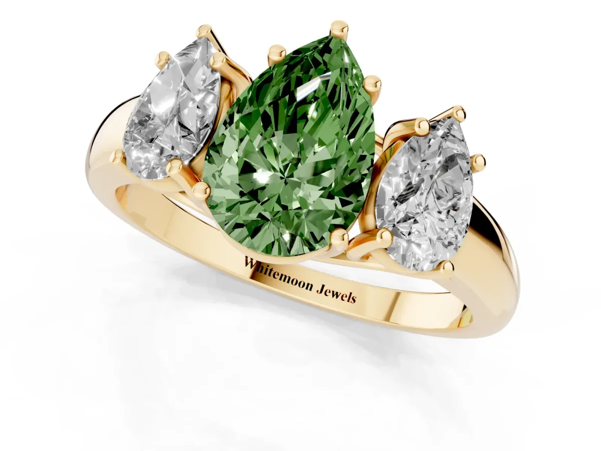 Fancy Green Three-Stone Pear Cut Diamond Engagement Ring with Prong Setting Yellow gold
