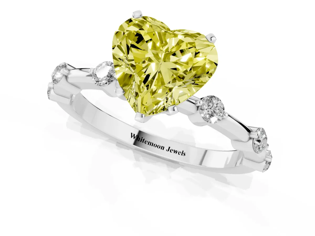 Fancy Yellow Heart Cut Solitaire Diamond Ring with Bezel Set Side Stones and Prong Setting Platinum