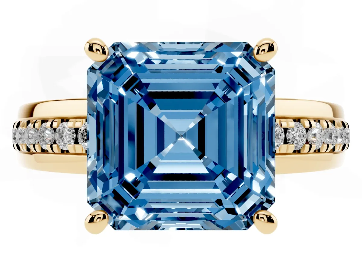 Fancy Blue Asscher Cut Solitaire Diamond Ring with Channel Set Band and Six-Prong Setting Yellow gold