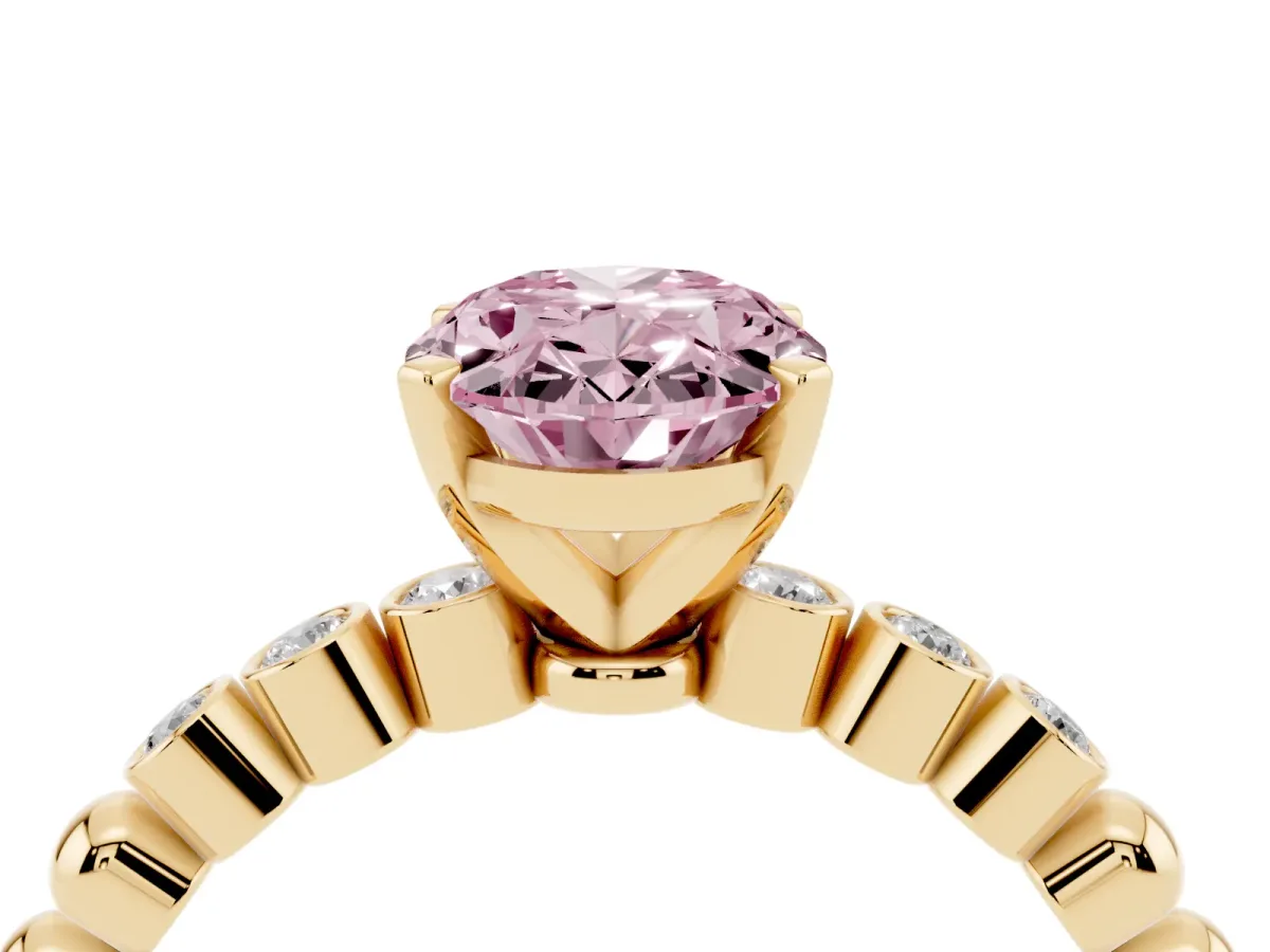 Fancy Pink Oval Cut Solitaire Bezel Accent Diamond Engagement Ring with Beaded Band and Four-Prong Setting Yellow gold