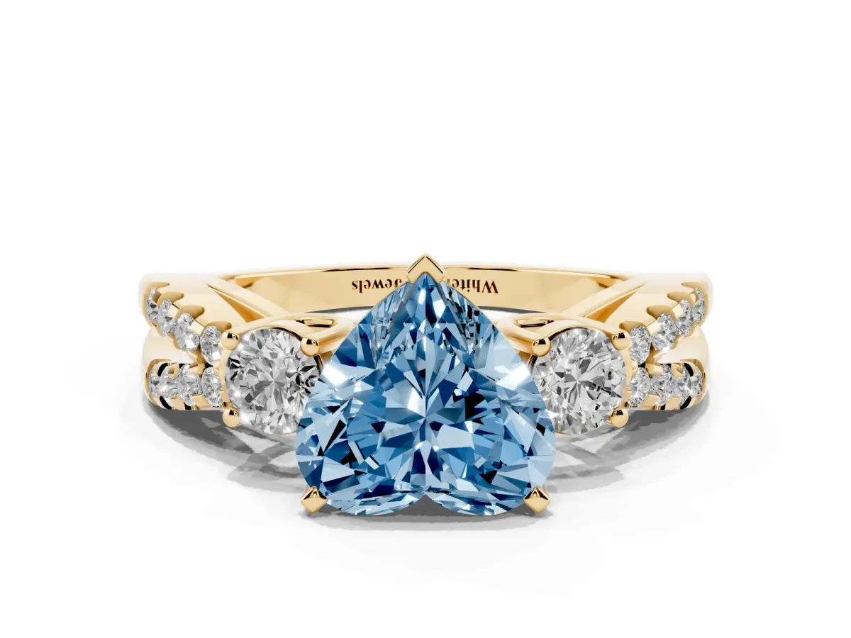 Fancy Blue Heart Cut Diamond Three-Stone Ring with Pavé Split Shank and Four-Prong Setting Yellow gold