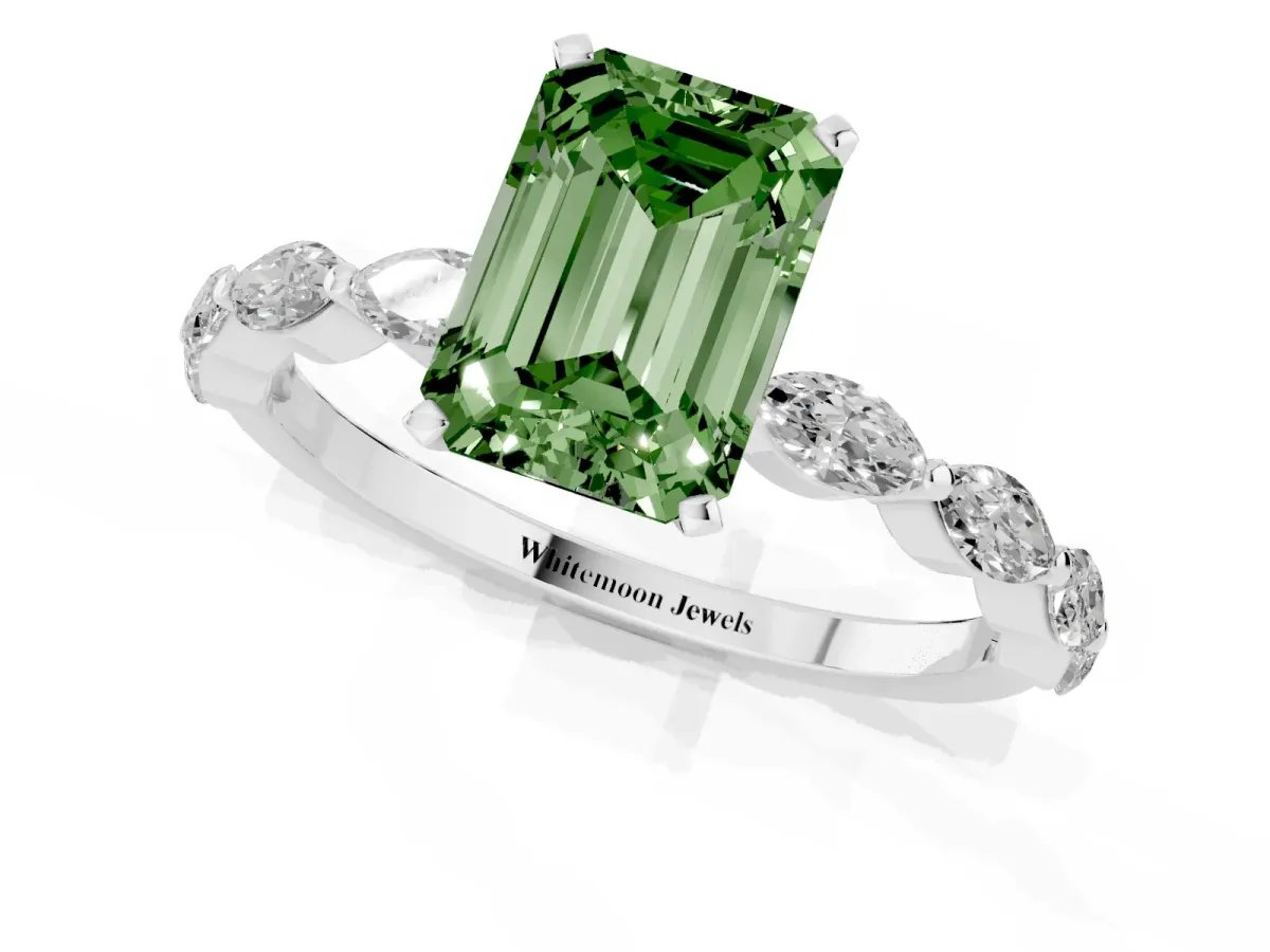 Fancy Green Emerald Cut Diamond Ring with Marquise Side Stones and Prong Setting Platinum