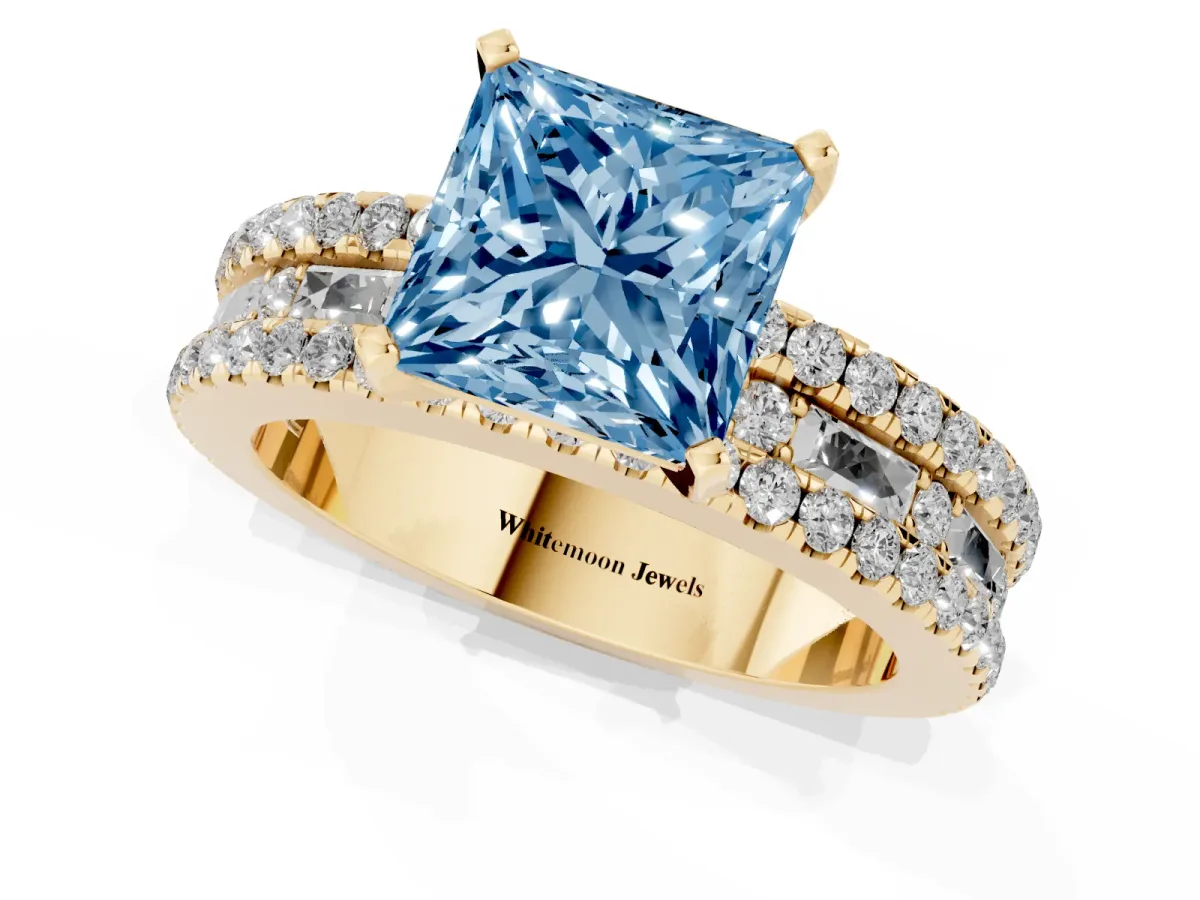 Fancy Blue Princess Cut Diamond Solitaire Ring with Pavé and Channel Set Band Yellow gold