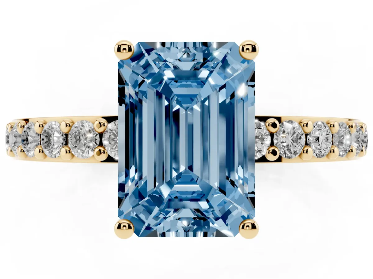 Fancy Blue Emerald Cut Cut Diamond Solitaire with Pave Band and Four-Prong Setting Yellow gold