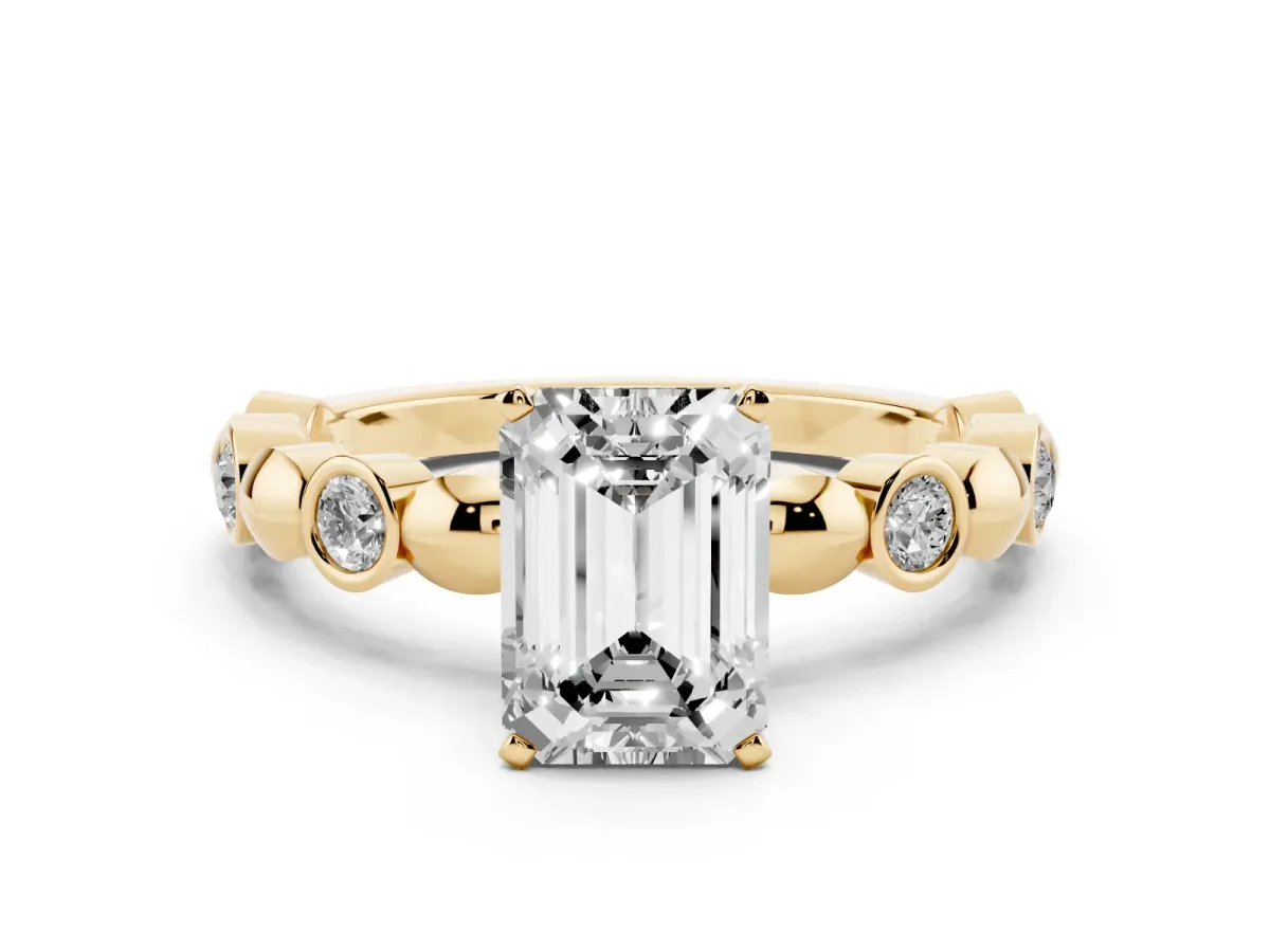 Emerald Cut Solitaire Bezel-Set Diamond Ring with Beaded Band and Four-Prong Setting Yellow gold