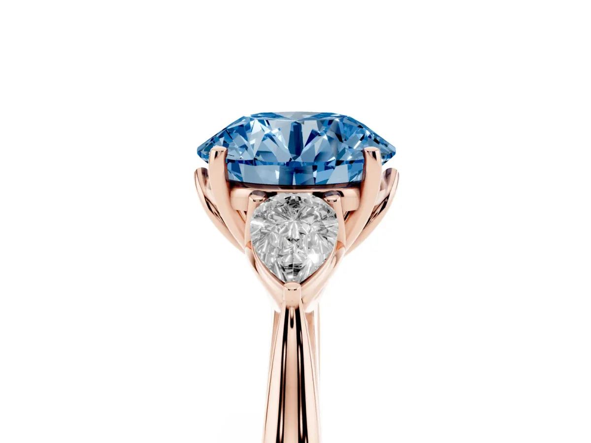 Fancy Blue Round Cut Diamond Three-Stone Ring with Pear Side Stones and Prong Setting Rose gold