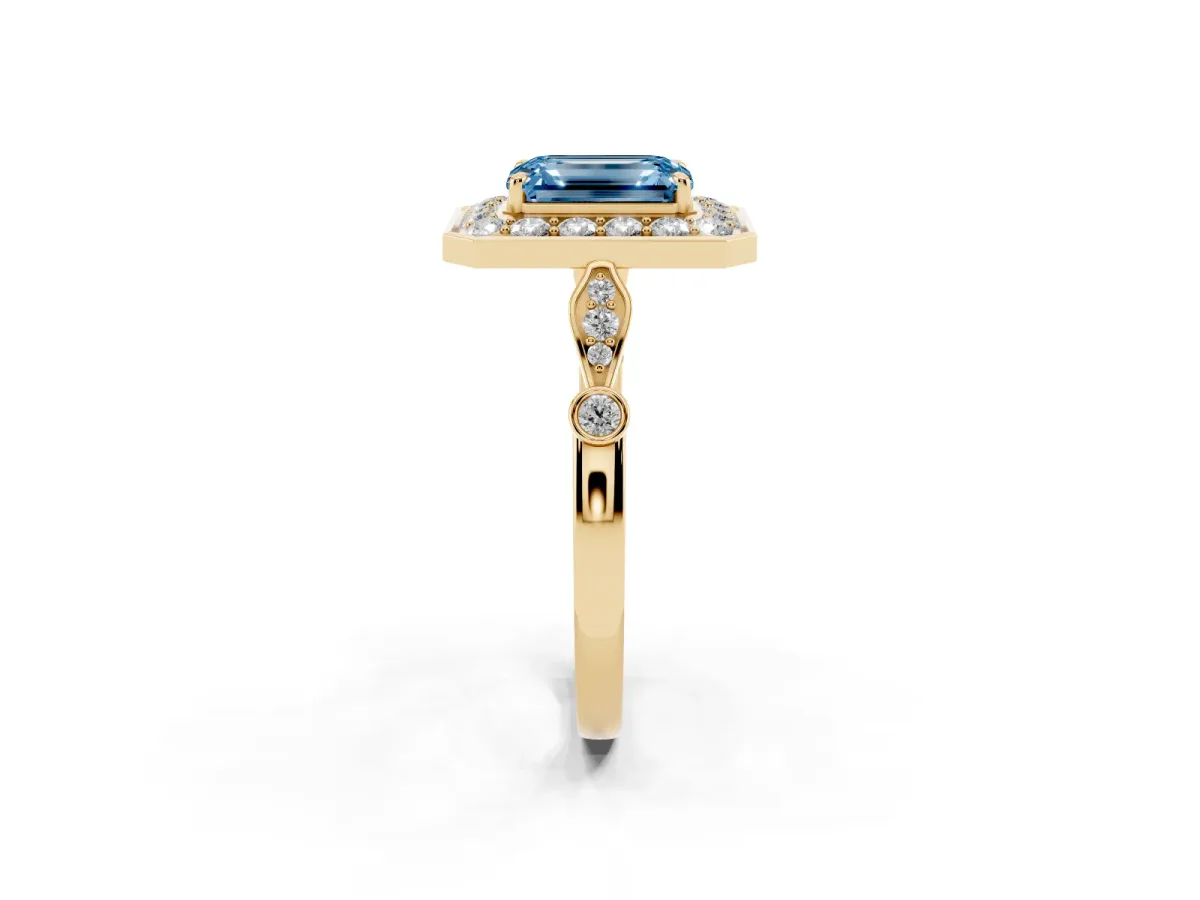 Fancy Blue Emerald Cut Halo Diamond Engagement Ring with Twisted Band and Four-Prong Setting Yellow gold