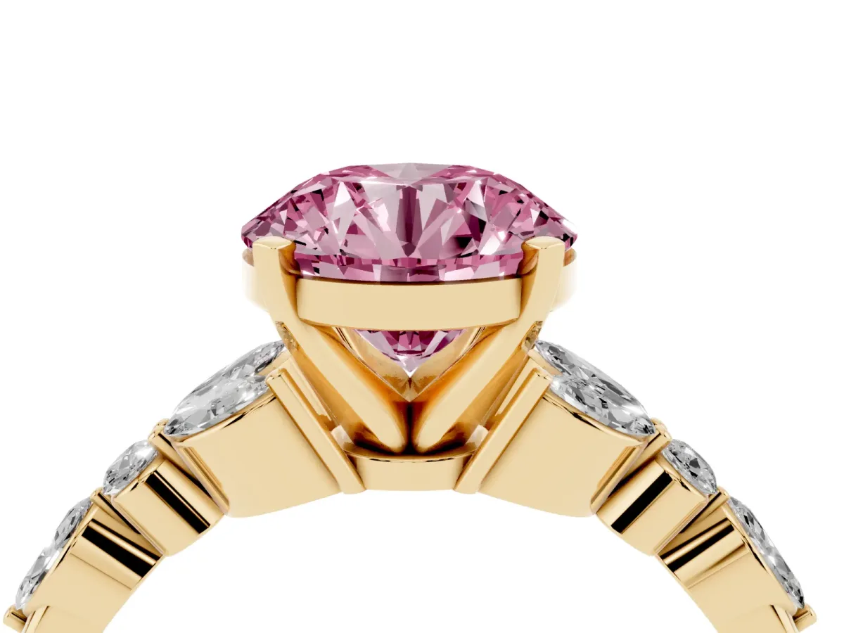 Fancy Pink Round Cut Diamond Solitaire Ring with Side Stones and Four-Prong Setting Yellow gold