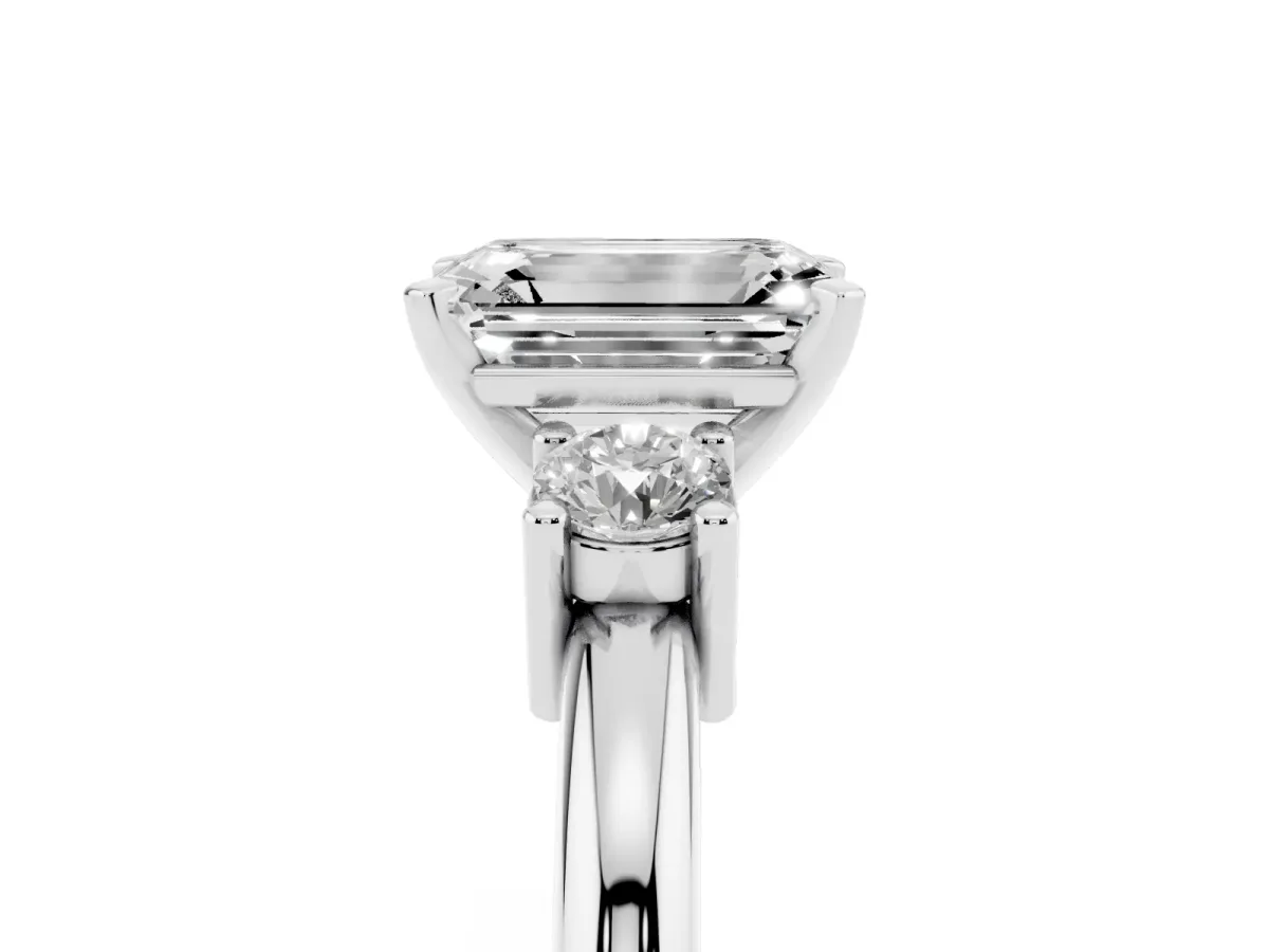 Three-Stone Emerald Cut Cut Diamond Solitaire with Prong Setting and Classic Band Silver