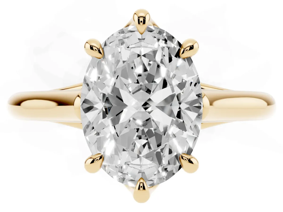 Oval Cut Solitaire Engagement Ring with Six-Prong Setting and Classic Band Yellow gold