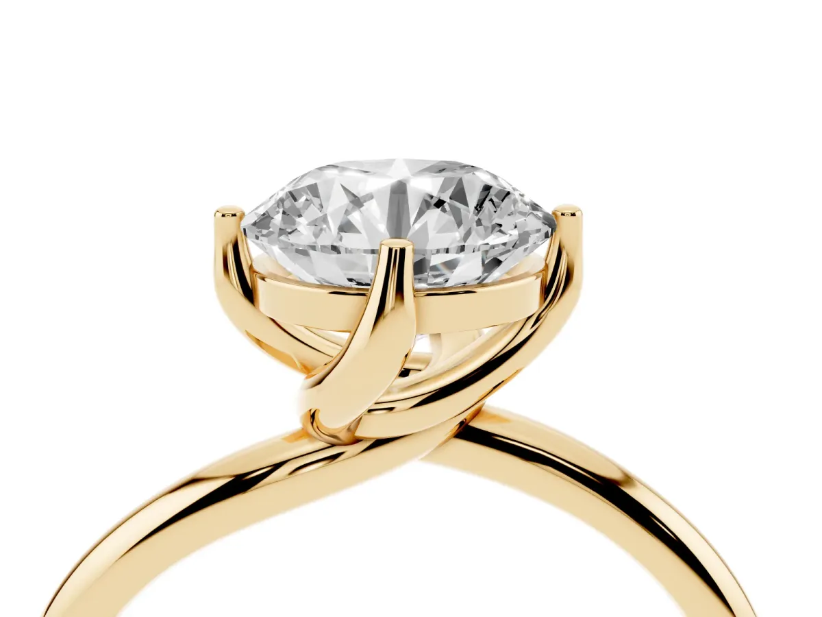 Round Cut Diamond Solitaire Engagement Ring with Four-Prong Setting and Classic Band Yellow gold